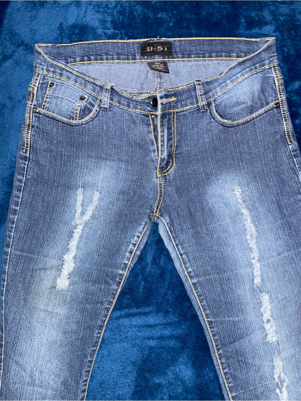 Women's Distressed Blue Jeans